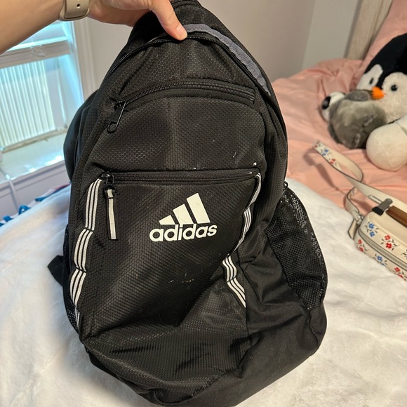 Black adidas backpack. Lots of space inside. Many pockets and can hold a lot. - Picture 3 of 3